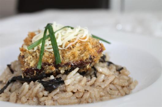 Carrilleras de cerdo ibérico sous-vide sobre risotto de setas